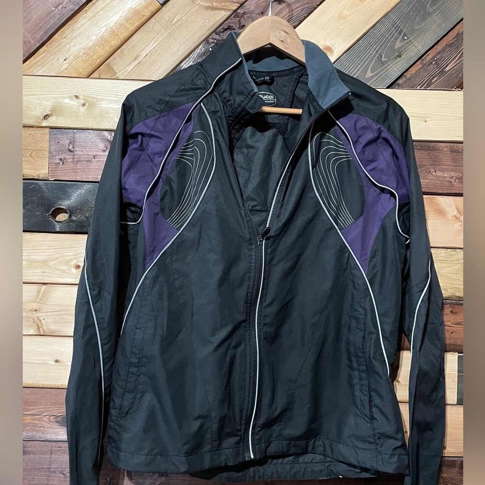 Vintages Woman’s size Large Sugoi Convertible Running Jacket.